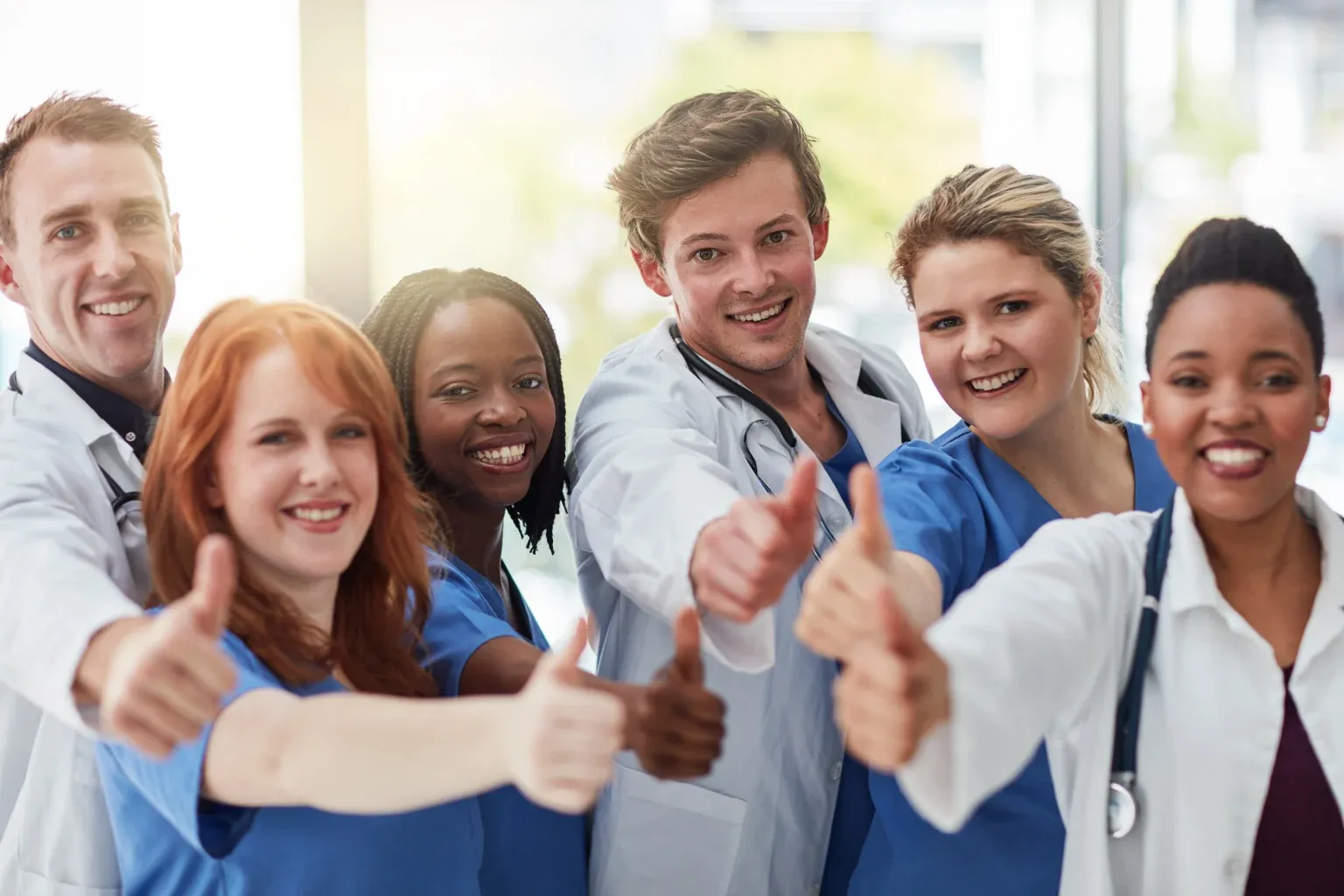 Happy Hospital Staff Thumbs Up